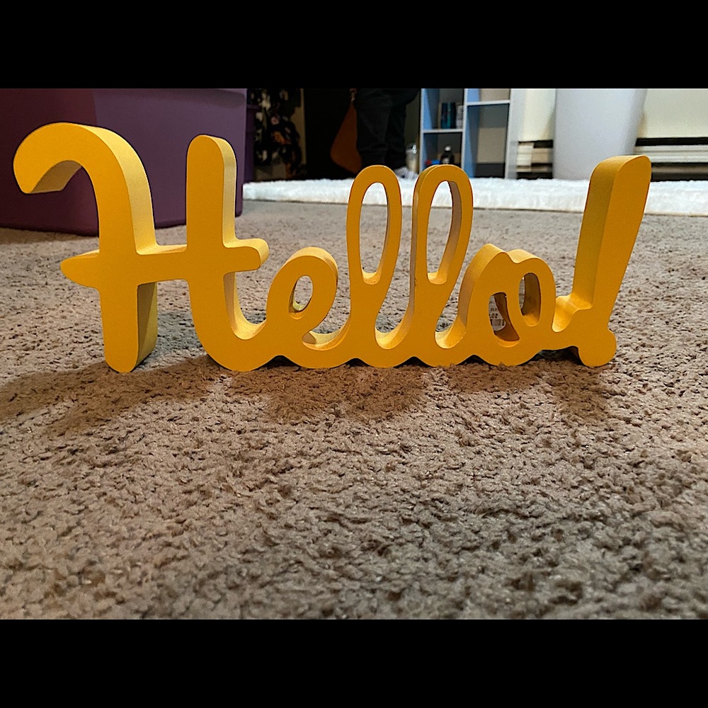 Yellow “hello” sign